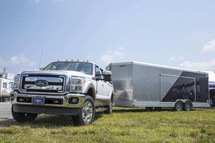 Ford Truck Towing Large Enclosed Trailer