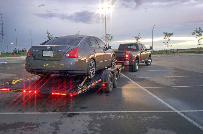 Pickup Truck Towing Car Trailer