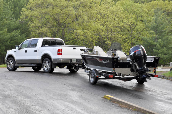 Truck Pulling Trailer with Fishing Boat