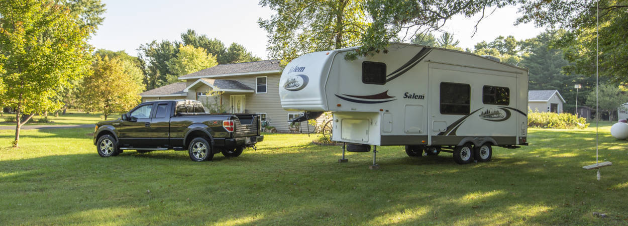 Unhitched 5th Wheel Trailer and Truck